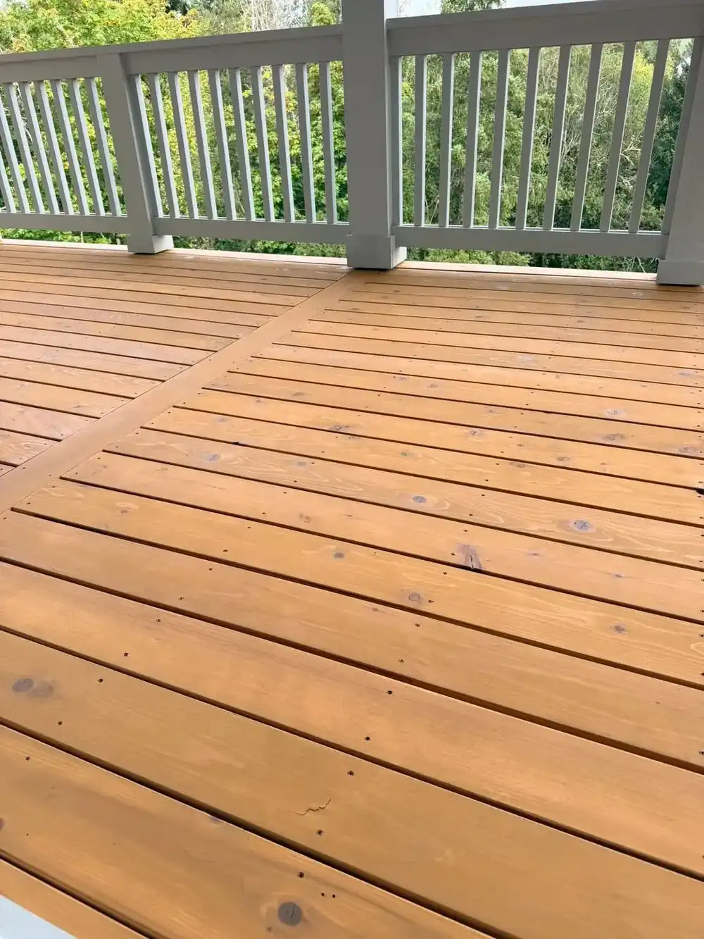 Close-up of a freshly stained wood deck
