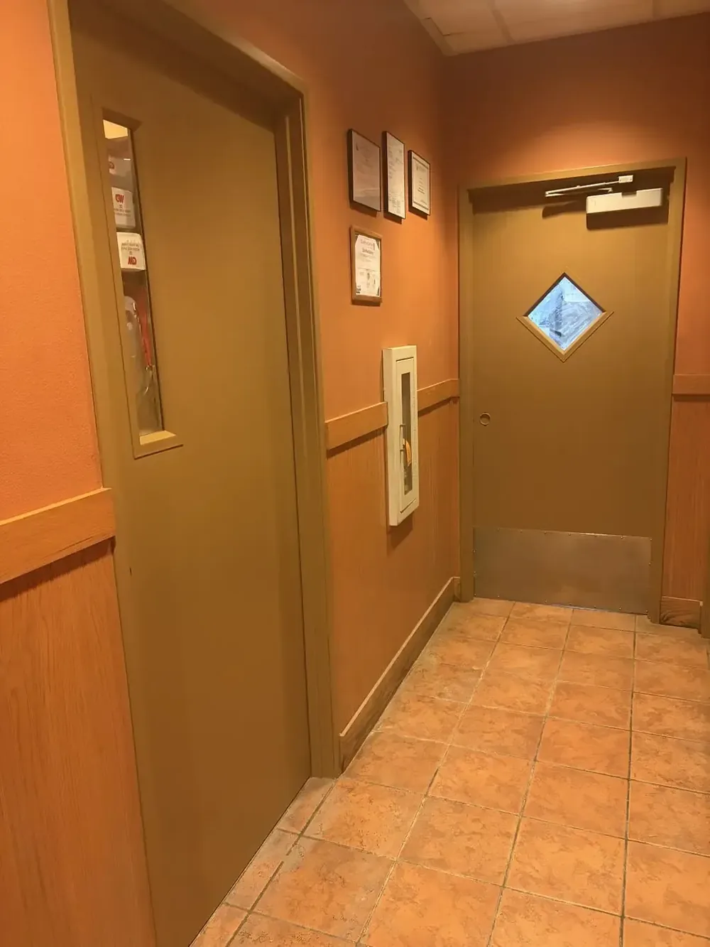 Hallway with freshly painted walls, trim and doors